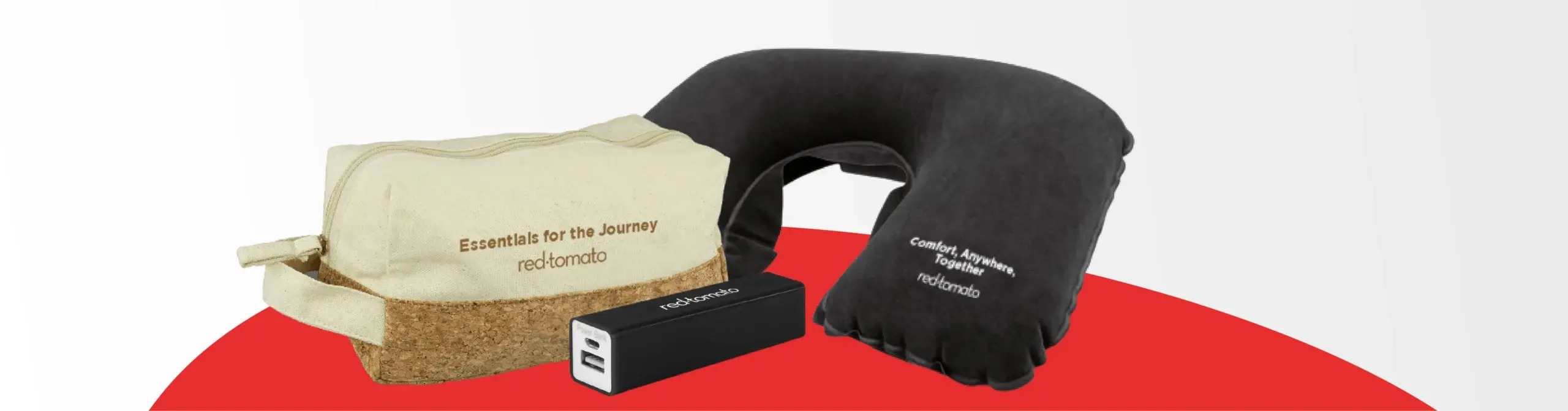 Neck pillow, toiletry bag, power bank, universal charger.