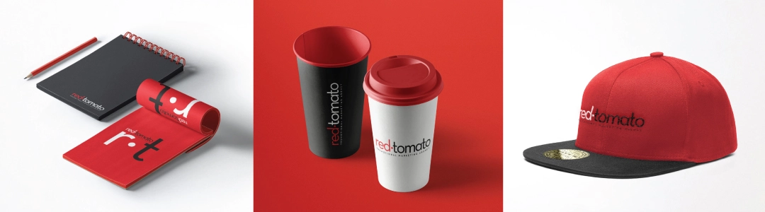 Red Tomato mug, cap, and notebook merchandise
